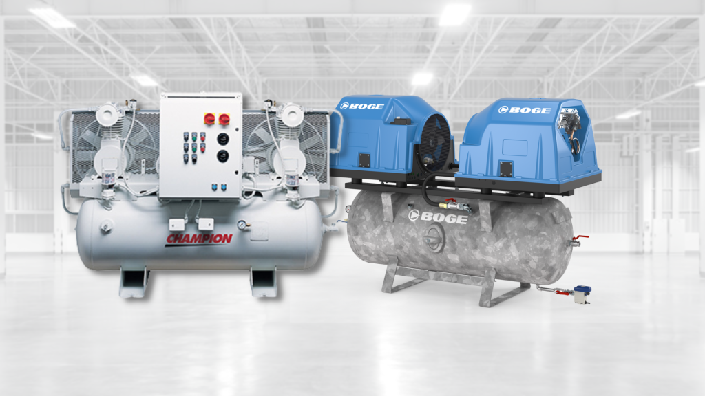Industrial air compressor system in a factory: Champion storage tank on the left and two blue BOGE units on a shared frame beside a control panel.
